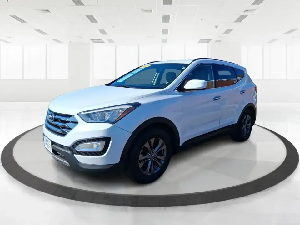 2013 Hyundai Santa Fe Sport (5XYZU3LB7DG) with an Theta II 2.4L I-4 gasoline direct injection engine, 6-Speed Automatic transmission, located at 1951 S Dayton Lakeview Rd., New Carlisle, OH, 45344, (937) 908-9800, 39.890999, -84.050255 - Need one SUV that can handle school drop-offs, I75 commutes, and a weekend escape to Taylorsville MetroPark without draining your budget? This 2013 Hyundai Santa Fe Sport is a smart, road-trip-ready crossover that blends everyday practicality with comfort features you'll appreciate on longer drives - Photo#8