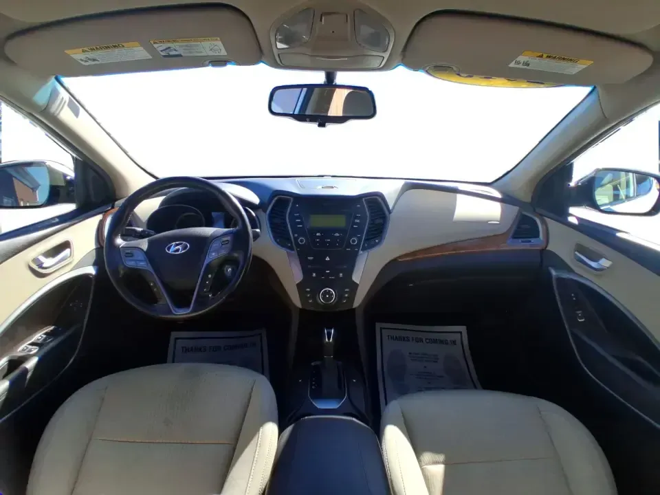 2013 Hyundai Santa Fe Sport (5XYZU3LB7DG) with an Theta II 2.4L I-4 gasoline direct injection engine, 6-Speed Automatic transmission, located at 1951 S Dayton Lakeview Rd., New Carlisle, OH, 45344, (937) 908-9800, 39.890999, -84.050255 - Need one SUV that can handle school drop-offs, I75 commutes, and a weekend escape to Taylorsville MetroPark without draining your budget? This 2013 Hyundai Santa Fe Sport is a smart, road-trip-ready crossover that blends everyday practicality with comfort features you'll appreciate on longer drives - Photo#20