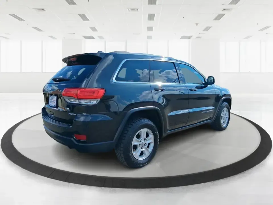 2015 Jeep Grand Cherokee Laredo (1C4RJFAG1FC) with an 3.6L V-6 DOHC engine, 8-Speed Automatic transmission, located at 8750 N County Rd 25A, Piqua, OH, 45356, (937) 908-9800, 40.164391, -84.232513 - Picture your next Ohio road trip: the family loaded up for a weekend at Indian Lake, a cooler in the back, and confidence on wet back roads or winter mornings. This 2015 Jeep Grand Cherokee Laredo is built for drivers who want everyday comfort with true SUV capability-perfect for long commutes, scho - Photo#2