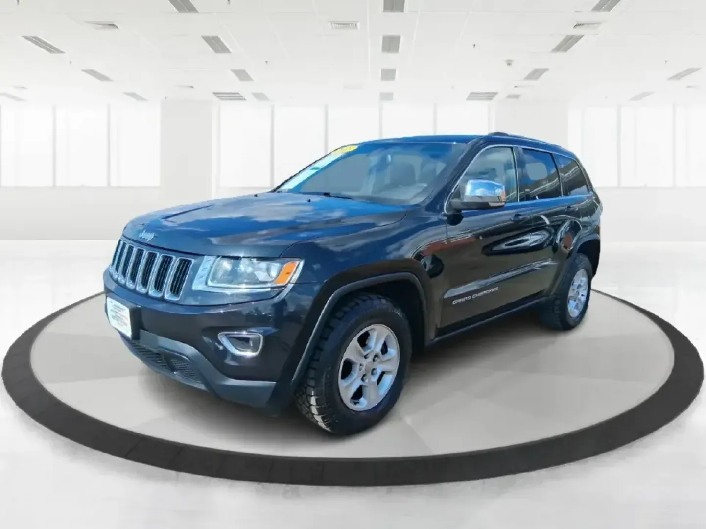 2015 Jeep Grand Cherokee Laredo (1C4RJFAG1FC) with an 3.6L V-6 DOHC engine, 8-Speed Automatic transmission, located at 8750 N County Rd 25A, Piqua, OH, 45356, (937) 908-9800, 40.164391, -84.232513 - Picture your next Ohio road trip: the family loaded up for a weekend at Indian Lake, a cooler in the back, and confidence on wet back roads or winter mornings. This 2015 Jeep Grand Cherokee Laredo is built for drivers who want everyday comfort with true SUV capability-perfect for long commutes, scho - Photo#8