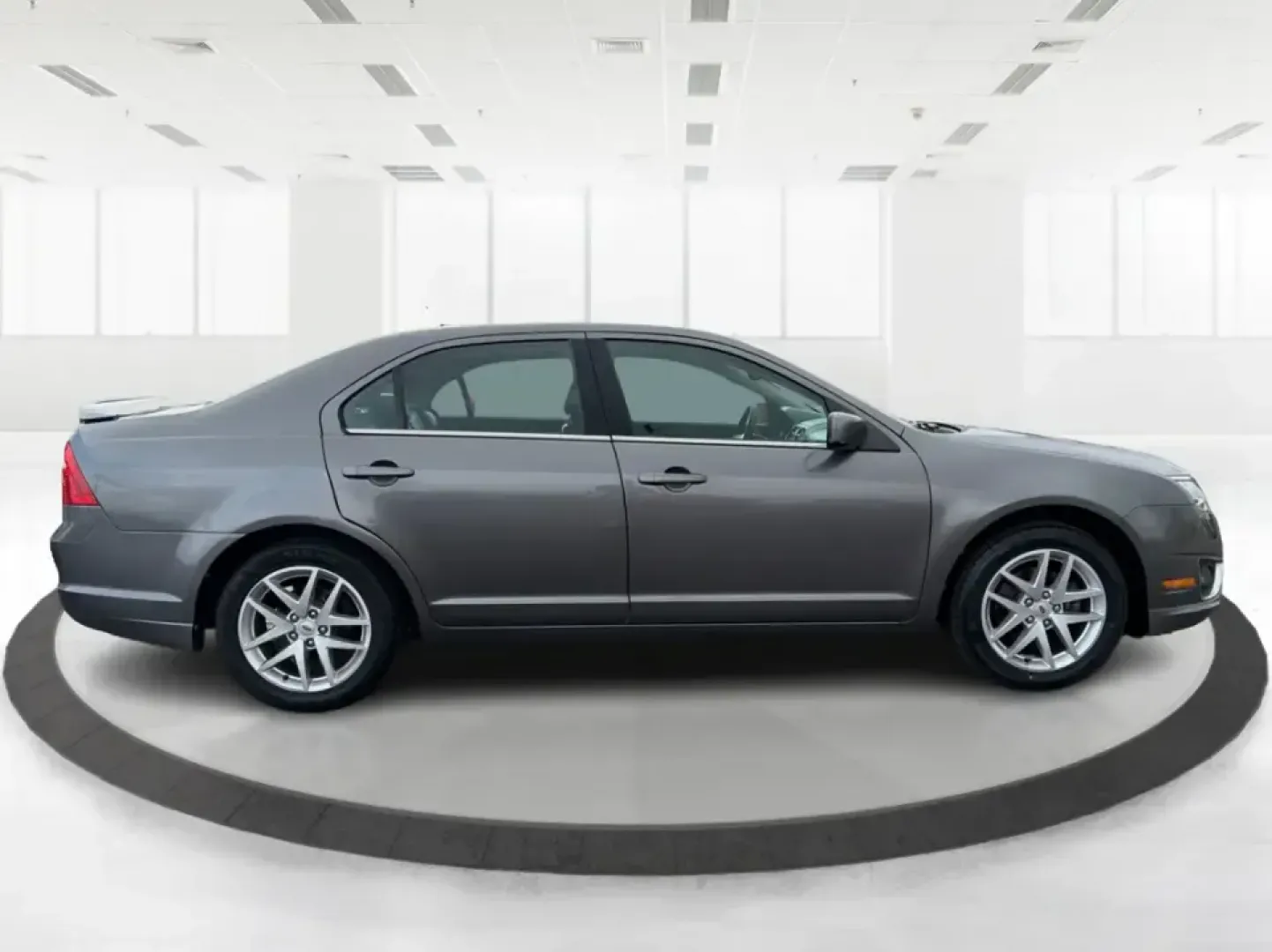 2012 Ford Fusion SEL (3FAHP0JG7CR) with an 3.0L V6 DOHC 24V engine, located at 1099 N County Rd 25A, Troy, OH, 45373, (937) 908-9800, 40.057079, -84.212883 - Need a dependable sedan that can handle the weekday commute to Dayton, quick runs up I75, and comfortable weekend drives through Miami County without draining your budget? This 2012 Ford Fusion SEL is a smart, real-world choice for drivers who want a smooth ride, confident power, and everyday practi - Photo#1