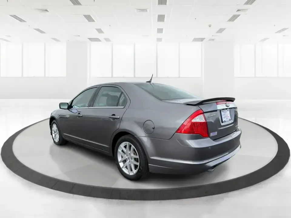 2012 Ford Fusion SEL (3FAHP0JG7CR) with an 3.0L V6 DOHC 24V engine, located at 1099 N County Rd 25A, Troy, OH, 45373, (937) 908-9800, 40.057079, -84.212883 - Need a dependable sedan that can handle the weekday commute to Dayton, quick runs up I75, and comfortable weekend drives through Miami County without draining your budget? This 2012 Ford Fusion SEL is a smart, real-world choice for drivers who want a smooth ride, confident power, and everyday practi - Photo#4