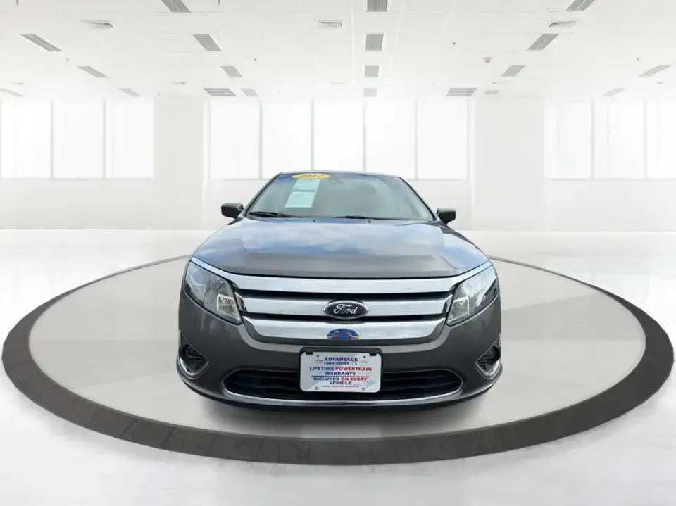 2012 Ford Fusion SEL (3FAHP0JG7CR) with an 3.0L V6 DOHC 24V engine, located at 1099 N County Rd 25A, Troy, OH, 45373, (937) 908-9800, 40.057079, -84.212883 - Need a dependable sedan that can handle the weekday commute to Dayton, quick runs up I75, and comfortable weekend drives through Miami County without draining your budget? This 2012 Ford Fusion SEL is a smart, real-world choice for drivers who want a smooth ride, confident power, and everyday practi - Photo#7