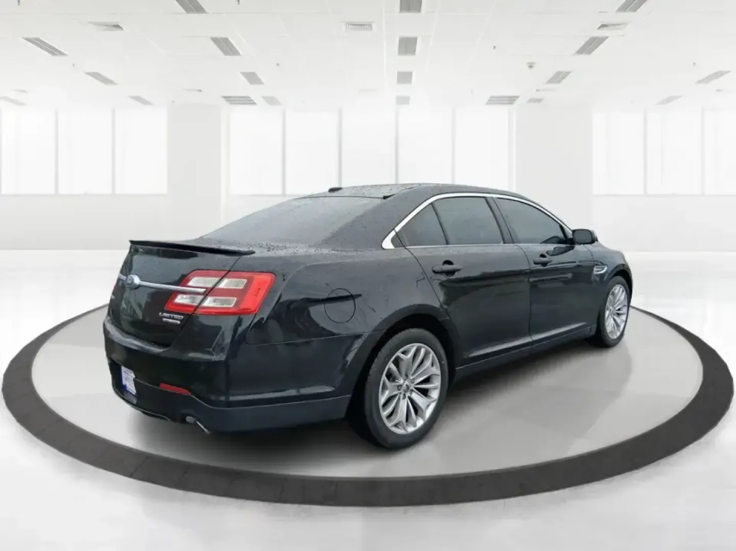 2014 Ford Taurus Limited FWD (1FAHP2F80EG) with an 3.5L V6 DOHC 24V engine, 6-Speed Automatic transmission, located at 8750 N County Rd 25A, Piqua, OH, 45356, (937) 908-9800, 40.164391, -84.232513 - Need a comfortable, confidence-inspiring sedan for a daily commute between Piqua and Dayton, school drop-offs, or weekend getaways up I-75? This 2014 Ford Taurus Limited FWD delivers the kind of quiet, upscale ride that makes long drives feel shorter-while still keeping practicality front and center - Photo#2