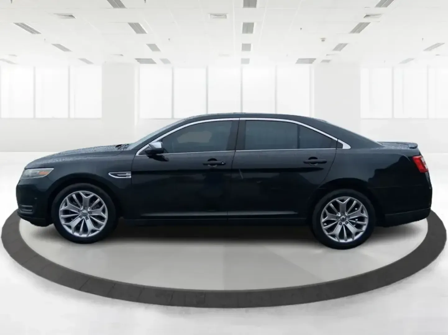 2014 Ford Taurus Limited FWD (1FAHP2F80EG) with an 3.5L V6 DOHC 24V engine, 6-Speed Automatic transmission, located at 8750 N County Rd 25A, Piqua, OH, 45356, (937) 908-9800, 40.164391, -84.232513 - Need a comfortable, confidence-inspiring sedan for a daily commute between Piqua and Dayton, school drop-offs, or weekend getaways up I-75? This 2014 Ford Taurus Limited FWD delivers the kind of quiet, upscale ride that makes long drives feel shorter-while still keeping practicality front and center - Photo#5