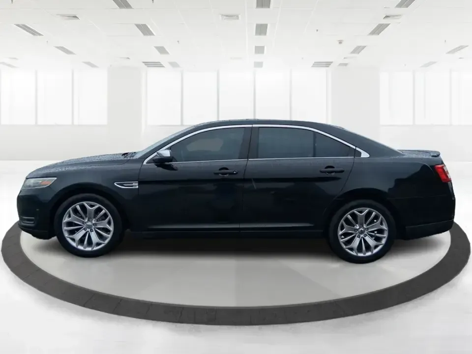 2014 Ford Taurus Limited FWD (1FAHP2F80EG) with an 3.5L V6 DOHC 24V engine, 6-Speed Automatic transmission, located at 8750 N County Rd 25A, Piqua, OH, 45356, (937) 908-9800, 40.164391, -84.232513 - Need a comfortable, confidence-inspiring sedan for a daily commute between Piqua and Dayton, school drop-offs, or weekend getaways up I-75? This 2014 Ford Taurus Limited FWD delivers the kind of quiet, upscale ride that makes long drives feel shorter-while still keeping practicality front and center - Photo#5