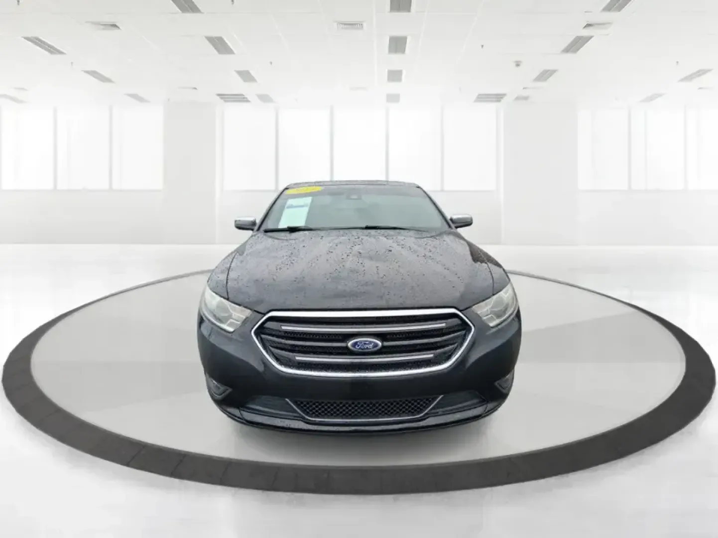 2014 Ford Taurus Limited FWD (1FAHP2F80EG) with an 3.5L V6 DOHC 24V engine, 6-Speed Automatic transmission, located at 8750 N County Rd 25A, Piqua, OH, 45356, (937) 908-9800, 40.164391, -84.232513 - Need a comfortable, confidence-inspiring sedan for a daily commute between Piqua and Dayton, school drop-offs, or weekend getaways up I-75? This 2014 Ford Taurus Limited FWD delivers the kind of quiet, upscale ride that makes long drives feel shorter-while still keeping practicality front and center - Photo#7