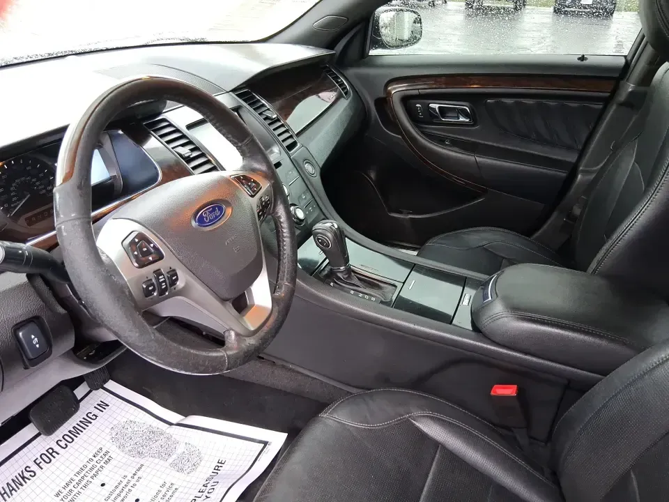 2014 Ford Taurus Limited FWD (1FAHP2F80EG) with an 3.5L V6 DOHC 24V engine, 6-Speed Automatic transmission, located at 8750 N County Rd 25A, Piqua, OH, 45356, (937) 908-9800, 40.164391, -84.232513 - Need a comfortable, confidence-inspiring sedan for a daily commute between Piqua and Dayton, school drop-offs, or weekend getaways up I-75? This 2014 Ford Taurus Limited FWD delivers the kind of quiet, upscale ride that makes long drives feel shorter-while still keeping practicality front and center - Photo#9