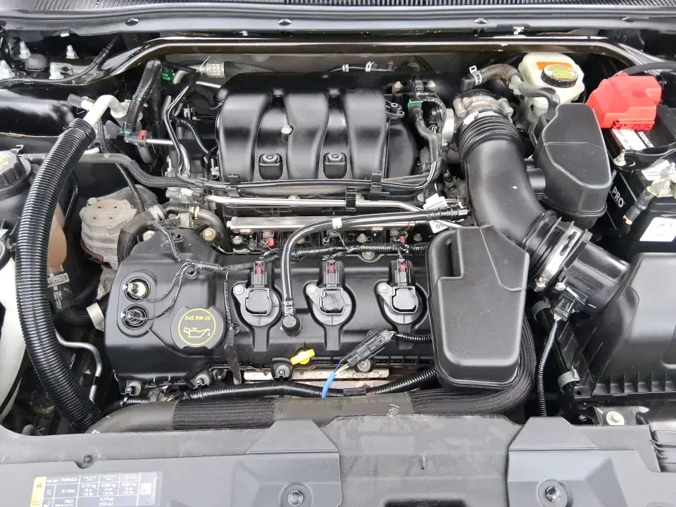 2014 Ford Taurus Limited FWD (1FAHP2F80EG) with an 3.5L V6 DOHC 24V engine, 6-Speed Automatic transmission, located at 8750 N County Rd 25A, Piqua, OH, 45356, (937) 908-9800, 40.164391, -84.232513 - Need a comfortable, confidence-inspiring sedan for a daily commute between Piqua and Dayton, school drop-offs, or weekend getaways up I-75? This 2014 Ford Taurus Limited FWD delivers the kind of quiet, upscale ride that makes long drives feel shorter-while still keeping practicality front and center - Photo#11