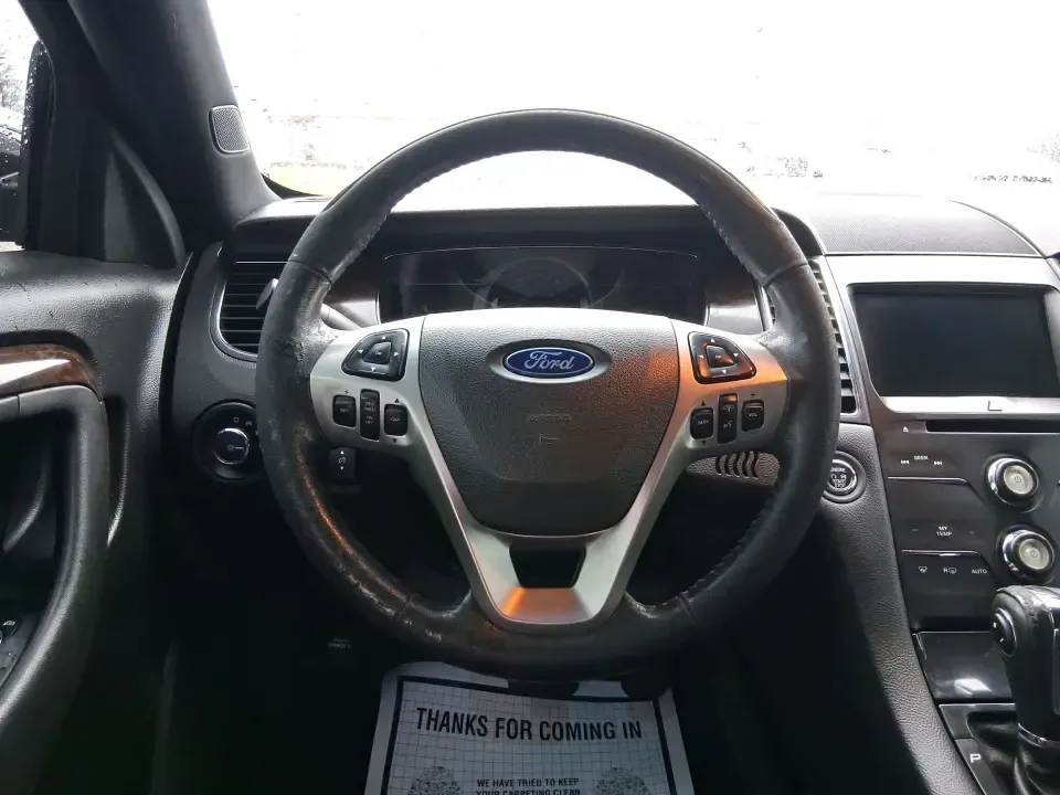 2014 Ford Taurus Limited FWD (1FAHP2F80EG) with an 3.5L V6 DOHC 24V engine, 6-Speed Automatic transmission, located at 8750 N County Rd 25A, Piqua, OH, 45356, (937) 908-9800, 40.164391, -84.232513 - Need a comfortable, confidence-inspiring sedan for a daily commute between Piqua and Dayton, school drop-offs, or weekend getaways up I-75? This 2014 Ford Taurus Limited FWD delivers the kind of quiet, upscale ride that makes long drives feel shorter-while still keeping practicality front and center - Photo#16