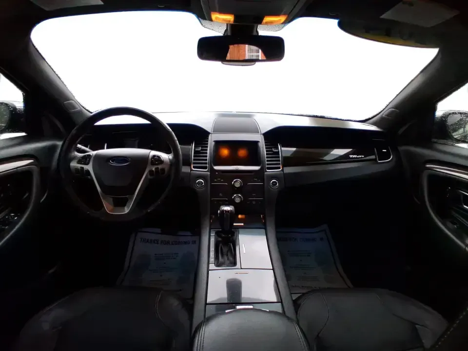 2014 Ford Taurus Limited FWD (1FAHP2F80EG) with an 3.5L V6 DOHC 24V engine, 6-Speed Automatic transmission, located at 8750 N County Rd 25A, Piqua, OH, 45356, (937) 908-9800, 40.164391, -84.232513 - Need a comfortable, confidence-inspiring sedan for a daily commute between Piqua and Dayton, school drop-offs, or weekend getaways up I-75? This 2014 Ford Taurus Limited FWD delivers the kind of quiet, upscale ride that makes long drives feel shorter-while still keeping practicality front and center - Photo#21