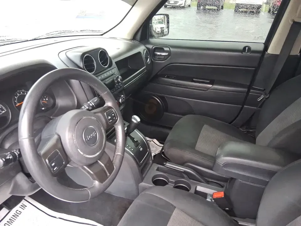 2015 Jeep Patriot Latitude (1C4NJRFB8FD) with an 2.4L I-4 DOHC engine, located at 8750 N County Rd 25A, Piqua, OH, 45356, (937) 908-9800, 40.164391, -84.232513 - Weekend escapes, snowy school runs, and daily commutes down I75 all get easier when you've got an SUV that's ready for Ohio weather and real-life schedules. This **2015 Jeep Patriot Latitude 4WD** is a practical choice for drivers who want the Jeep look and capability without the oversized footprint - Photo#9