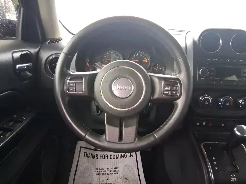 2015 Jeep Patriot Latitude (1C4NJRFB8FD) with an 2.4L I-4 DOHC engine, located at 8750 N County Rd 25A, Piqua, OH, 45356, (937) 908-9800, 40.164391, -84.232513 - Weekend escapes, snowy school runs, and daily commutes down I75 all get easier when you've got an SUV that's ready for Ohio weather and real-life schedules. This **2015 Jeep Patriot Latitude 4WD** is a practical choice for drivers who want the Jeep look and capability without the oversized footprint - Photo#16