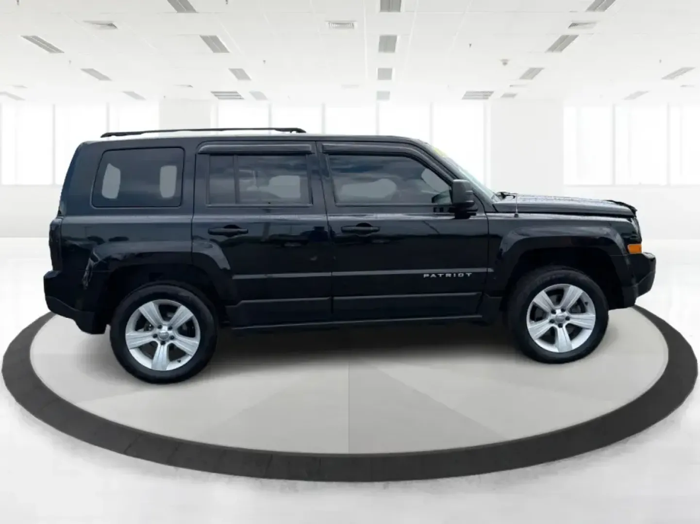 2015 Jeep Patriot Latitude 4WD (1C4NJRFB8FD) with an 2.4L L4 DOHC 16V engine, located at 401 Woodman Dr, Riverside, OH, 45431, (937) 908-9800, 39.760899, -84.123421 - Weekend getaways, snowy commutes, and everyday errands feel a lot easier when you've got an SUV that's ready for whatever Ohio throws your way. This **2015 Jeep Patriot Latitude 4WD** is a practical choice for drivers who want confident traction, versatile cargo space, and a comfortable cabin for fi- Photo#1