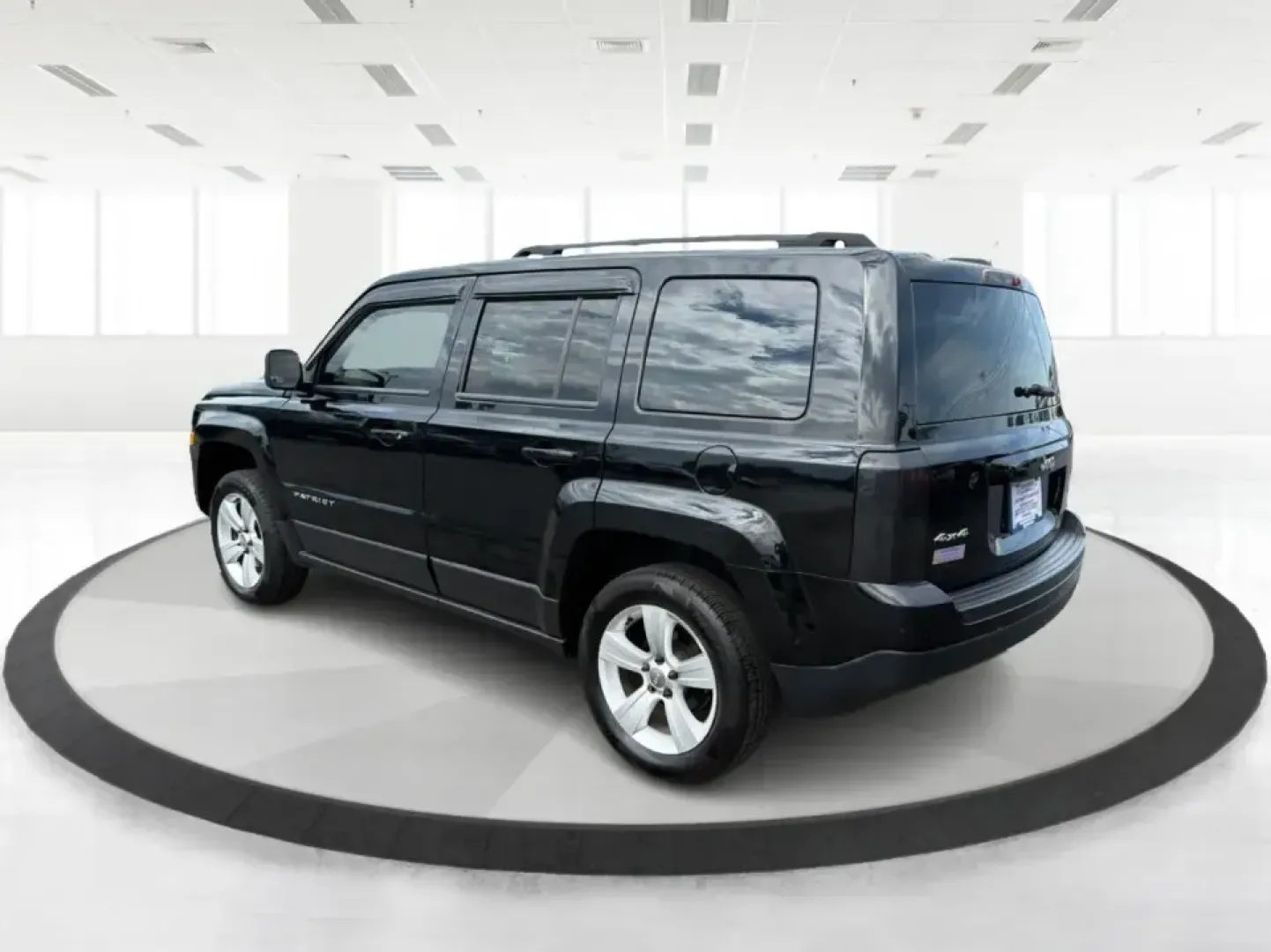 2015 Jeep Patriot Latitude 4WD (1C4NJRFB8FD) with an 2.4L L4 DOHC 16V engine, located at 401 Woodman Dr, Riverside, OH, 45431, (937) 908-9800, 39.760899, -84.123421 - Weekend getaways, snowy commutes, and everyday errands feel a lot easier when you've got an SUV that's ready for whatever Ohio throws your way. This **2015 Jeep Patriot Latitude 4WD** is a practical choice for drivers who want confident traction, versatile cargo space, and a comfortable cabin for fi- Photo#4