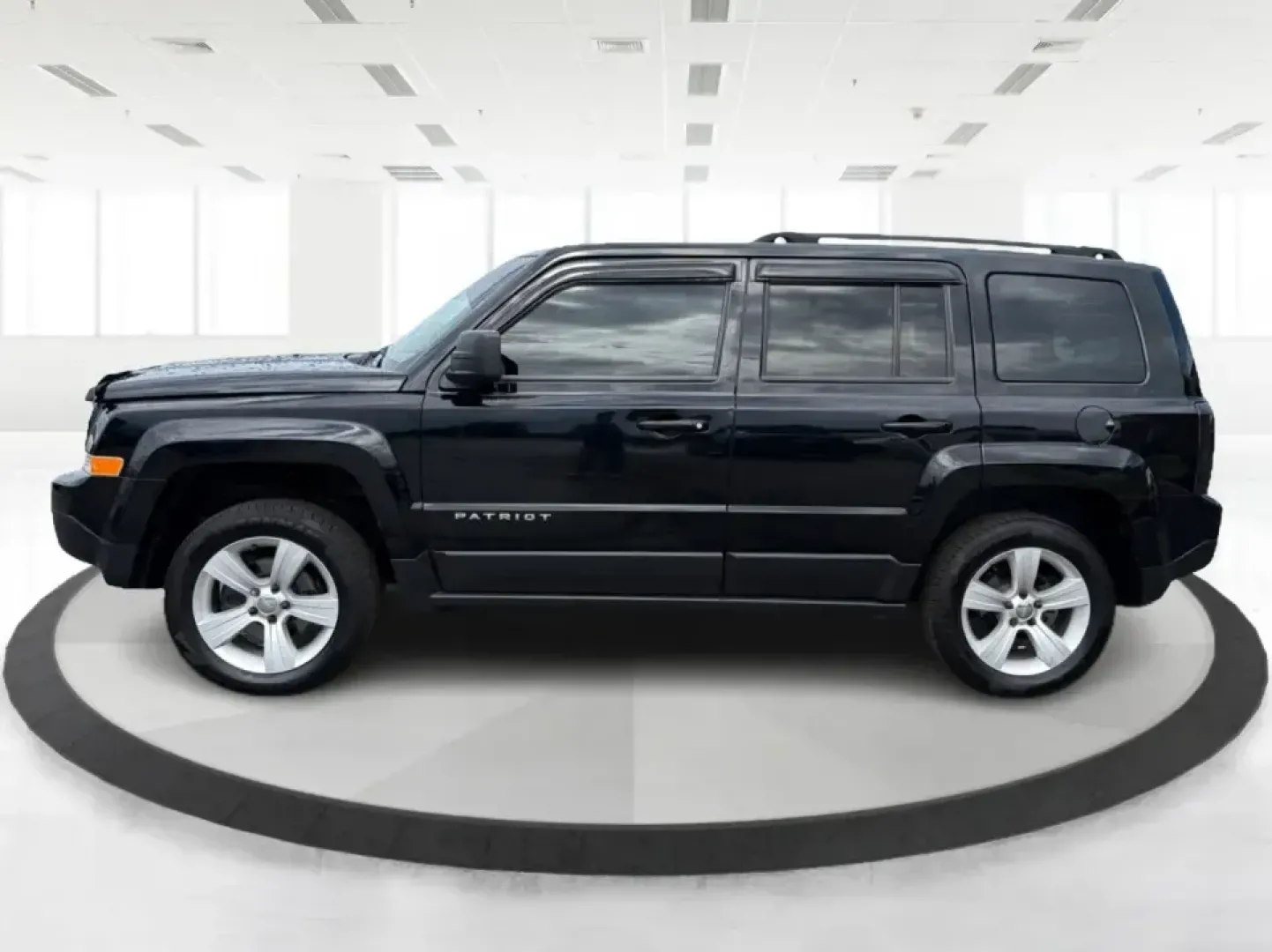2015 Jeep Patriot Latitude 4WD (1C4NJRFB8FD) with an 2.4L L4 DOHC 16V engine, located at 401 Woodman Dr, Riverside, OH, 45431, (937) 908-9800, 39.760899, -84.123421 - Weekend getaways, snowy commutes, and everyday errands feel a lot easier when you've got an SUV that's ready for whatever Ohio throws your way. This **2015 Jeep Patriot Latitude 4WD** is a practical choice for drivers who want confident traction, versatile cargo space, and a comfortable cabin for fi- Photo#5