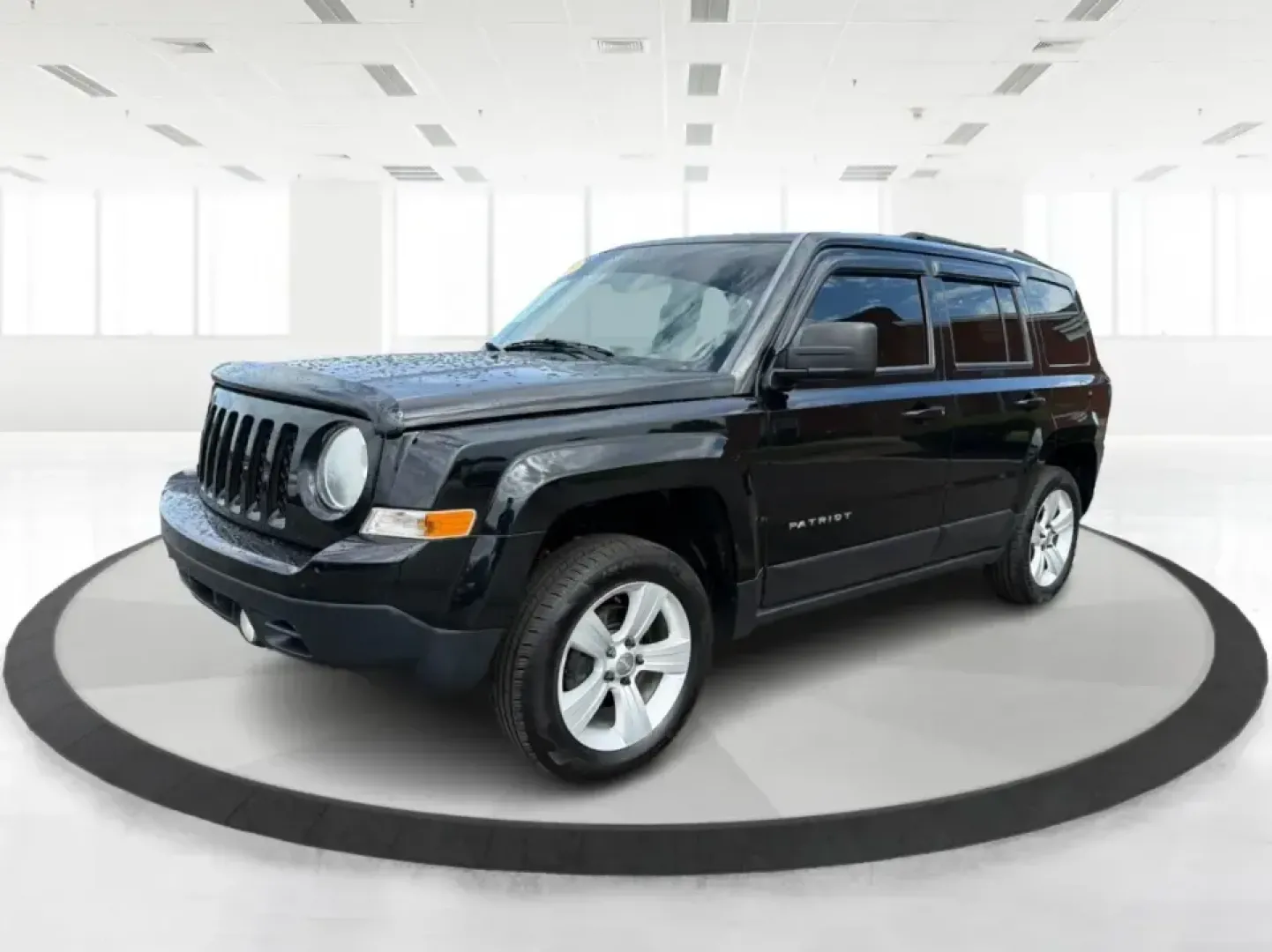 2015 Jeep Patriot Latitude 4WD (1C4NJRFB8FD) with an 2.4L L4 DOHC 16V engine, located at 401 Woodman Dr, Riverside, OH, 45431, (937) 908-9800, 39.760899, -84.123421 - Weekend getaways, snowy commutes, and everyday errands feel a lot easier when you've got an SUV that's ready for whatever Ohio throws your way. This **2015 Jeep Patriot Latitude 4WD** is a practical choice for drivers who want confident traction, versatile cargo space, and a comfortable cabin for fi- Photo#8