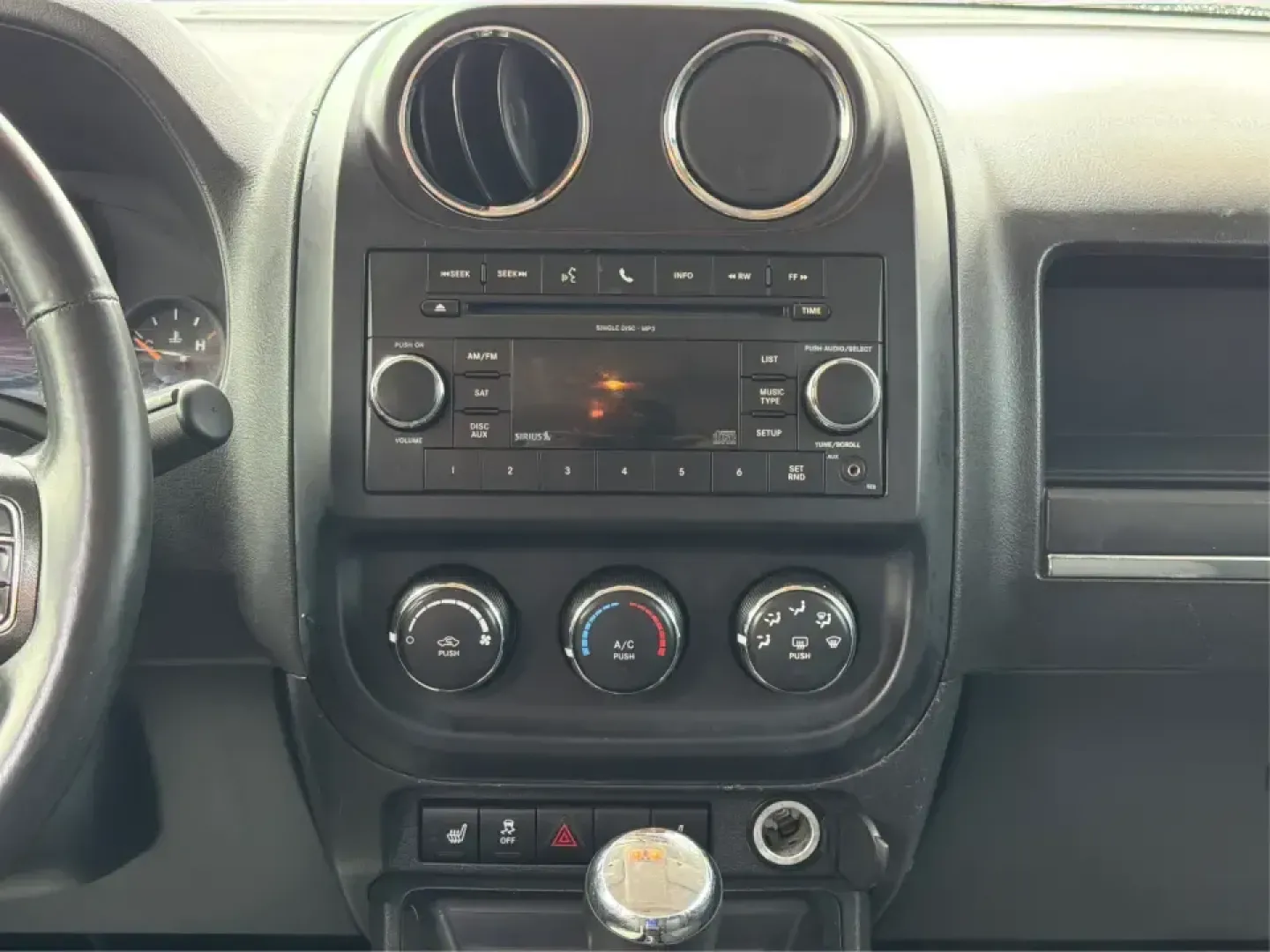 2015 Jeep Patriot Latitude 4WD (1C4NJRFB8FD) with an 2.4L L4 DOHC 16V engine, located at 401 Woodman Dr, Riverside, OH, 45431, (937) 908-9800, 39.760899, -84.123421 - Weekend getaways, snowy commutes, and everyday errands feel a lot easier when you've got an SUV that's ready for whatever Ohio throws your way. This **2015 Jeep Patriot Latitude 4WD** is a practical choice for drivers who want confident traction, versatile cargo space, and a comfortable cabin for fi- Photo#13