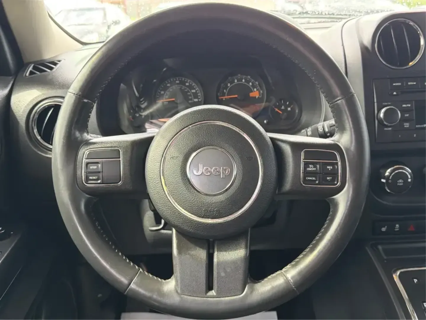 2015 Jeep Patriot Latitude 4WD (1C4NJRFB8FD) with an 2.4L L4 DOHC 16V engine, located at 401 Woodman Dr, Riverside, OH, 45431, (937) 908-9800, 39.760899, -84.123421 - Weekend getaways, snowy commutes, and everyday errands feel a lot easier when you've got an SUV that's ready for whatever Ohio throws your way. This **2015 Jeep Patriot Latitude 4WD** is a practical choice for drivers who want confident traction, versatile cargo space, and a comfortable cabin for fi- Photo#16