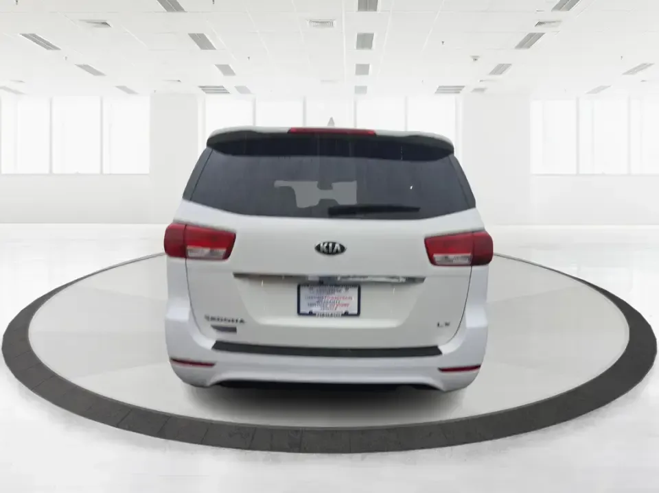 2016 Kia Sedona LX (KNDMB5C11G6) with an Lambda 3.3L V-6 gasoline direct injection engine, 6-Speed Automatic transmission, located at 401 Woodman Dr, Riverside, OH, 45431, (937) 908-9800, 39.760899, -84.123421 - Picture your next weekend: the kids piled in with snacks and sports gear, a cooler in the back, and enough space so everyone can stretch out on the drive down South Dixie Dr toward Dayton's parks, festivals, and family attractions. If you need a dependable, budget-smart people mover that keeps daily - Photo#2