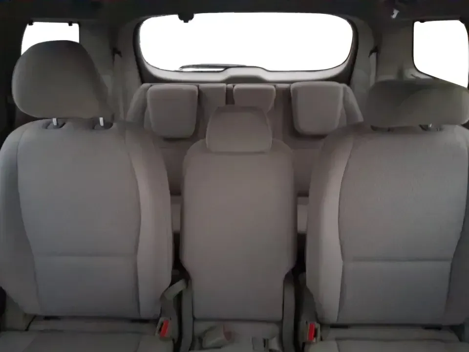 2016 Kia Sedona LX (KNDMB5C11G6) with an Lambda 3.3L V-6 gasoline direct injection engine, 6-Speed Automatic transmission, located at 401 Woodman Dr, Riverside, OH, 45431, (937) 908-9800, 39.760899, -84.123421 - Picture your next weekend: the kids piled in with snacks and sports gear, a cooler in the back, and enough space so everyone can stretch out on the drive down South Dixie Dr toward Dayton's parks, festivals, and family attractions. If you need a dependable, budget-smart people mover that keeps daily - Photo#11