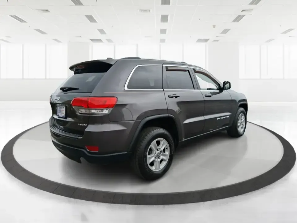 2015 Jeep Grand Cherokee Laredo (1C4RJFAG5FC) with an 3.6L V-6 DOHC engine, 8-Speed Automatic transmission, located at 1951 S Dayton Lakeview Rd., New Carlisle, OH, 45344, (937) 908-9800, 39.890999, -84.050255 - Need one SUV that can handle school drop-offs in the morning, a smooth I75 commute at lunchtime, and a last-minute weekend escape to the Miami Valley trails? This 2015 Jeep Grand Cherokee Laredo 4WD is built for real life in Troy, Ohio-comfortable enough for daily driving, confident enough for unpre - Photo#2