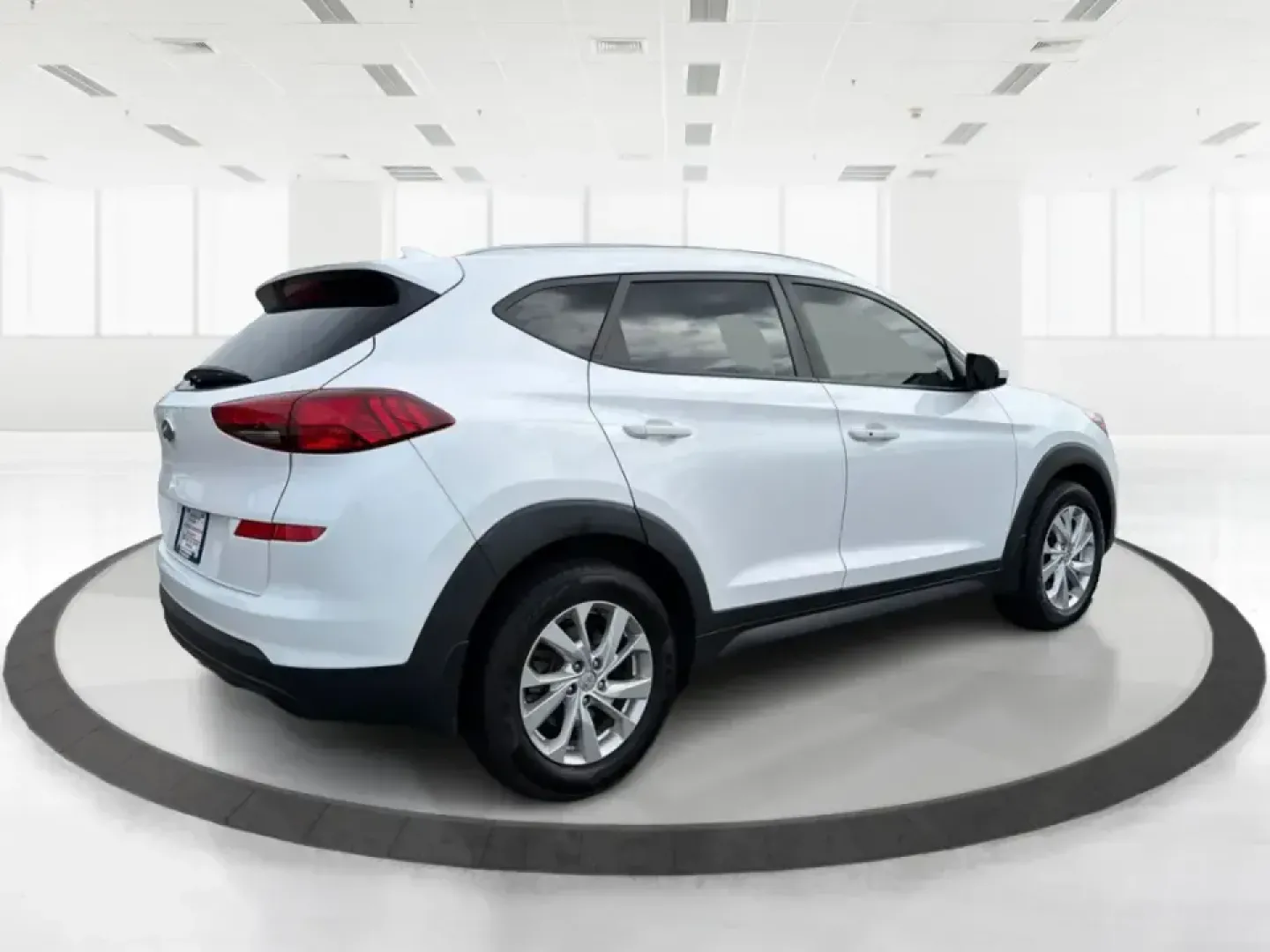 2019 Hyundai Tucson Value (KM8J33A41KU) with an Nu 2L I-4 gasoline direct injection engine, 6A transmission, located at 8750 N County Rd 25A, Piqua, OH, 45356, (937) 908-9800, 40.164391, -84.232513 - Picture your next Ohio weekend: loading up the cooler, tossing sports gear in the back, and cruising from Piqua to a family cookout or a quick getaway-without stressing about space, comfort, or the road ahead. This **2019 Hyundai Tucson Value** in **White Pearl** is the kind of compact SUV that fits - Photo#2