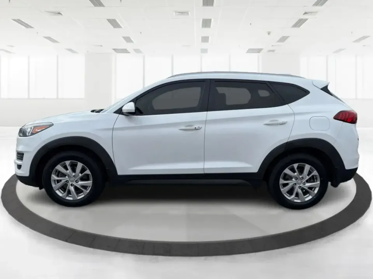 2019 Hyundai Tucson Value (KM8J33A41KU) with an Nu 2L I-4 gasoline direct injection engine, 6A transmission, located at 8750 N County Rd 25A, Piqua, OH, 45356, (937) 908-9800, 40.164391, -84.232513 - Picture your next Ohio weekend: loading up the cooler, tossing sports gear in the back, and cruising from Piqua to a family cookout or a quick getaway-without stressing about space, comfort, or the road ahead. This **2019 Hyundai Tucson Value** in **White Pearl** is the kind of compact SUV that fits - Photo#5
