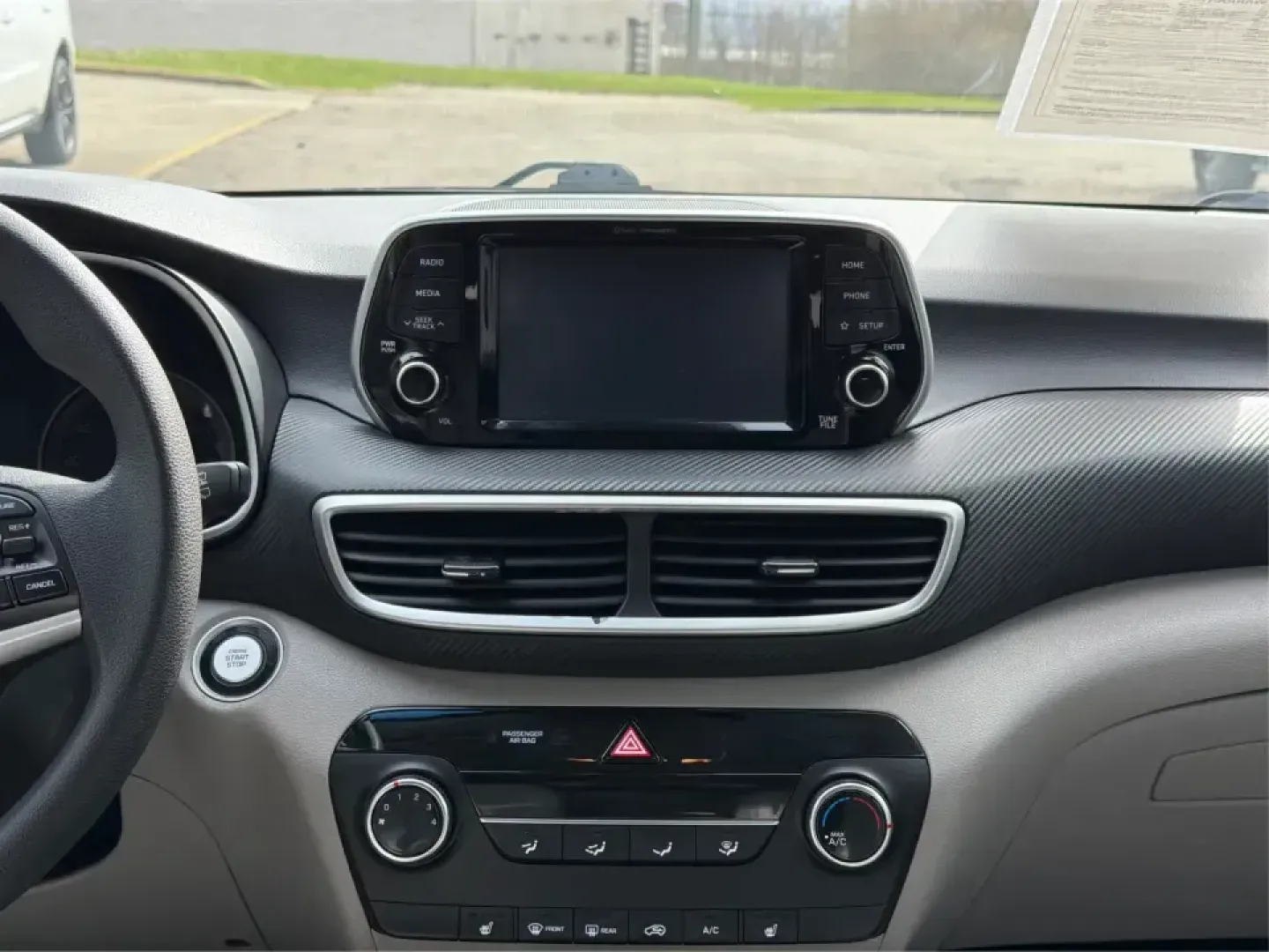 2019 Hyundai Tucson Value (KM8J33A41KU) with an Nu 2L I-4 gasoline direct injection engine, 6A transmission, located at 8750 N County Rd 25A, Piqua, OH, 45356, (937) 908-9800, 40.164391, -84.232513 - Picture your next Ohio weekend: loading up the cooler, tossing sports gear in the back, and cruising from Piqua to a family cookout or a quick getaway-without stressing about space, comfort, or the road ahead. This **2019 Hyundai Tucson Value** in **White Pearl** is the kind of compact SUV that fits - Photo#13