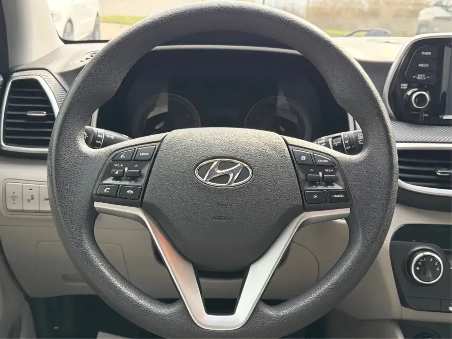 2019 Hyundai Tucson Value (KM8J33A41KU) with an Nu 2L I-4 gasoline direct injection engine, 6A transmission, located at 8750 N County Rd 25A, Piqua, OH, 45356, (937) 908-9800, 40.164391, -84.232513 - Picture your next Ohio weekend: loading up the cooler, tossing sports gear in the back, and cruising from Piqua to a family cookout or a quick getaway-without stressing about space, comfort, or the road ahead. This **2019 Hyundai Tucson Value** in **White Pearl** is the kind of compact SUV that fits - Photo#16