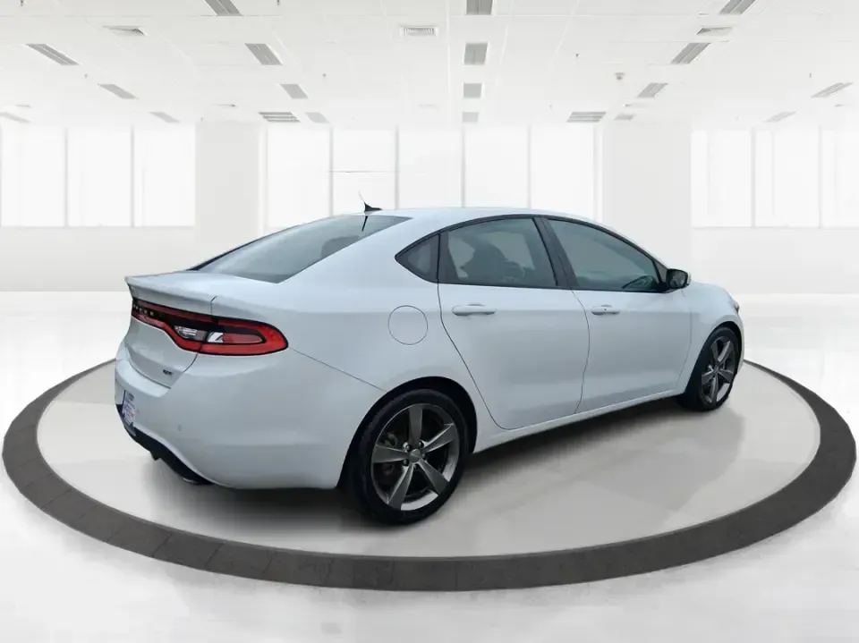 2014 Dodge Dart GT (1C3CDFEB0ED) with an MultiAir 2.4L I-4 variable valve control engine, located at 8750 N County Rd 25A, Piqua, OH, 45356, (937) 908-9800, 40.164391, -84.232513 - Need a smart, sporty commuter that feels upscale for daily runs between Moraine and downtown Dayton, yet still has the comfort for weekend getaways to Carillon Historical Park or a Reds day trip? This 2014 Dodge Dart GT in Bright White Clearcoat is the kind of sedan that fits real life-easy to park, - Photo#2