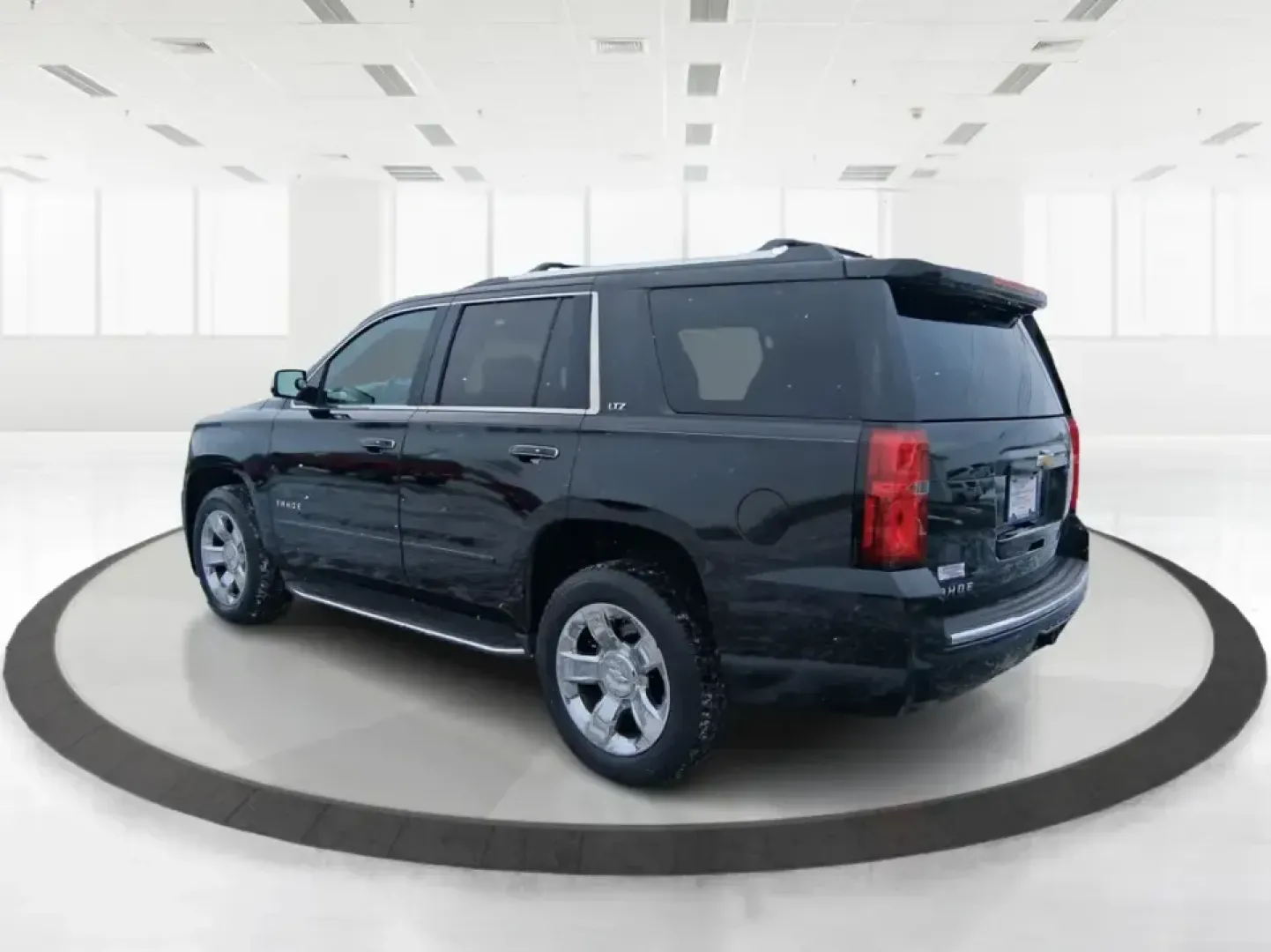 2015 Chevrolet Tahoe LTZ (1GNSKCKC9FR) with an EcoTec3 5.3L V-8 gasoline direct injection engine, 6-Speed Automatic transmission, located at 4508 South Dixie Dr, Moraine, OH, 45439, (937) 908-9800, 39.689976, -84.218452 - Big family weekend at Indian Lake, a road-trip up I-75, or a daily commute with room for coworkers and gear-this 2015 Chevrolet Tahoe LTZ 4WD is built for the kind of life that doesn't fit in a small SUV. Finished in sleek Black and powered by the EcoTec3 5.3L V8 with a smooth 6-speed automatic tran - Photo#4