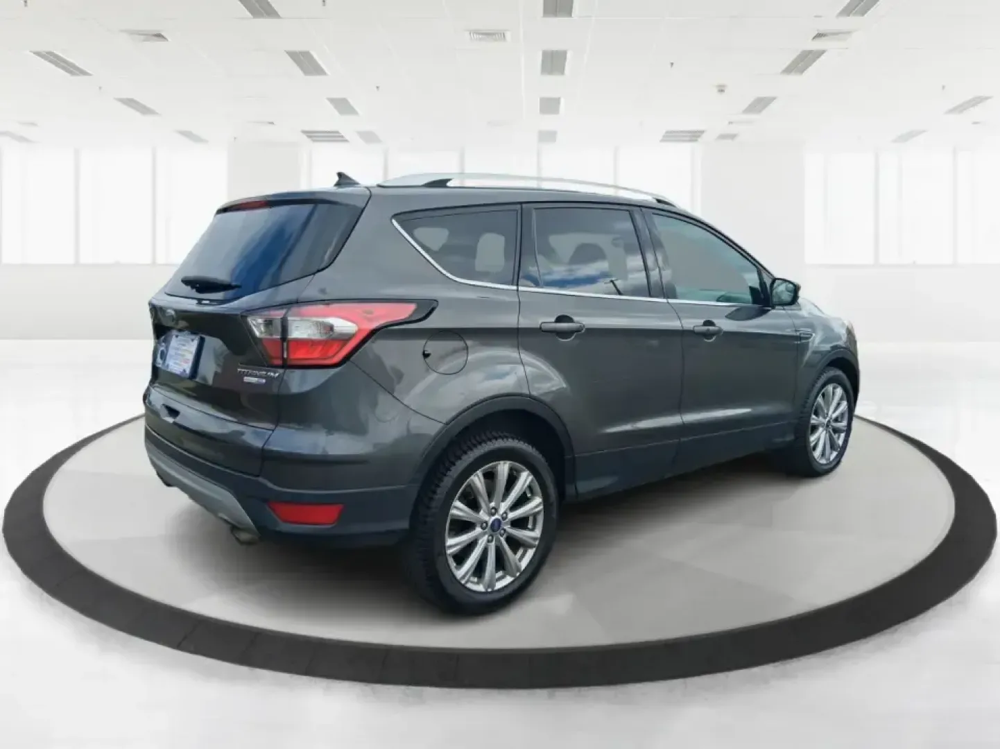 2018 Ford Escape Titanium (1FMCU9J94JU) with an EcoBoost 2L I-4 gasoline direct injection engine, 6A transmission, located at 4508 South Dixie Dr, Moraine, OH, 45439, (937) 908-9800, 39.689976, -84.218452 - Pack up the kids, load the groceries, or point the hood toward a weekend getaway-this 2018 Ford Escape Titanium is the kind of compact SUV that fits real life in Moraine. With confident capability for Ohio weather and a comfortable, tech-forward cabin, it's ideal for long commutes down I-75, quick e- Photo#2