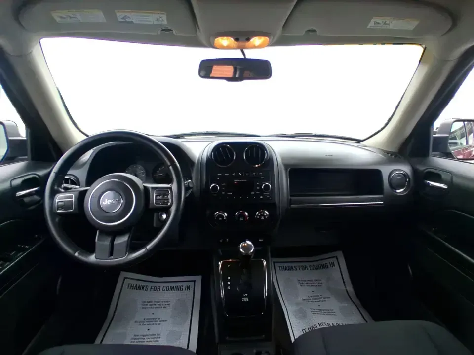 2014 Jeep Patriot Latitude (1C4NJPFB3ED) with an 2.4L L4 DOHC 16V engine, located at 8750 N County Rd 25A, Piqua, OH, 45356, (937) 908-9800, 40.164391, -84.232513 - Pack up the snacks, cue the playlist, and point the hood toward your next weekend escape-this 2014 Jeep Patriot Latitude is the kind of practical SUV that fits real life in West Central Ohio, whether you're commuting daily, shuttling kids to practice, or chasing fall colors on a backroad drive. Fini - Photo#19