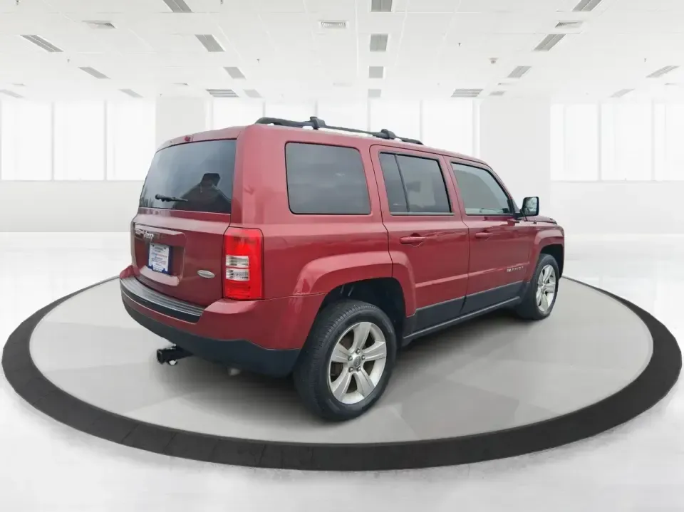 2014 Jeep Patriot Latitude (1C4NJPFB3ED) with an 2.4L L4 DOHC 16V engine, located at 1951 S Dayton Lakeview Rd., New Carlisle, OH, 45344, (937) 908-9800, 39.890999, -84.050255 - Pack up the snacks, cue the playlist, and point the hood toward your next weekend escape-this 2014 Jeep Patriot Latitude is the kind of practical SUV that fits real life in West Central Ohio, whether you're commuting daily, shuttling kids to practice, or chasing fall colors on a backroad drive. Fini - Photo#2
