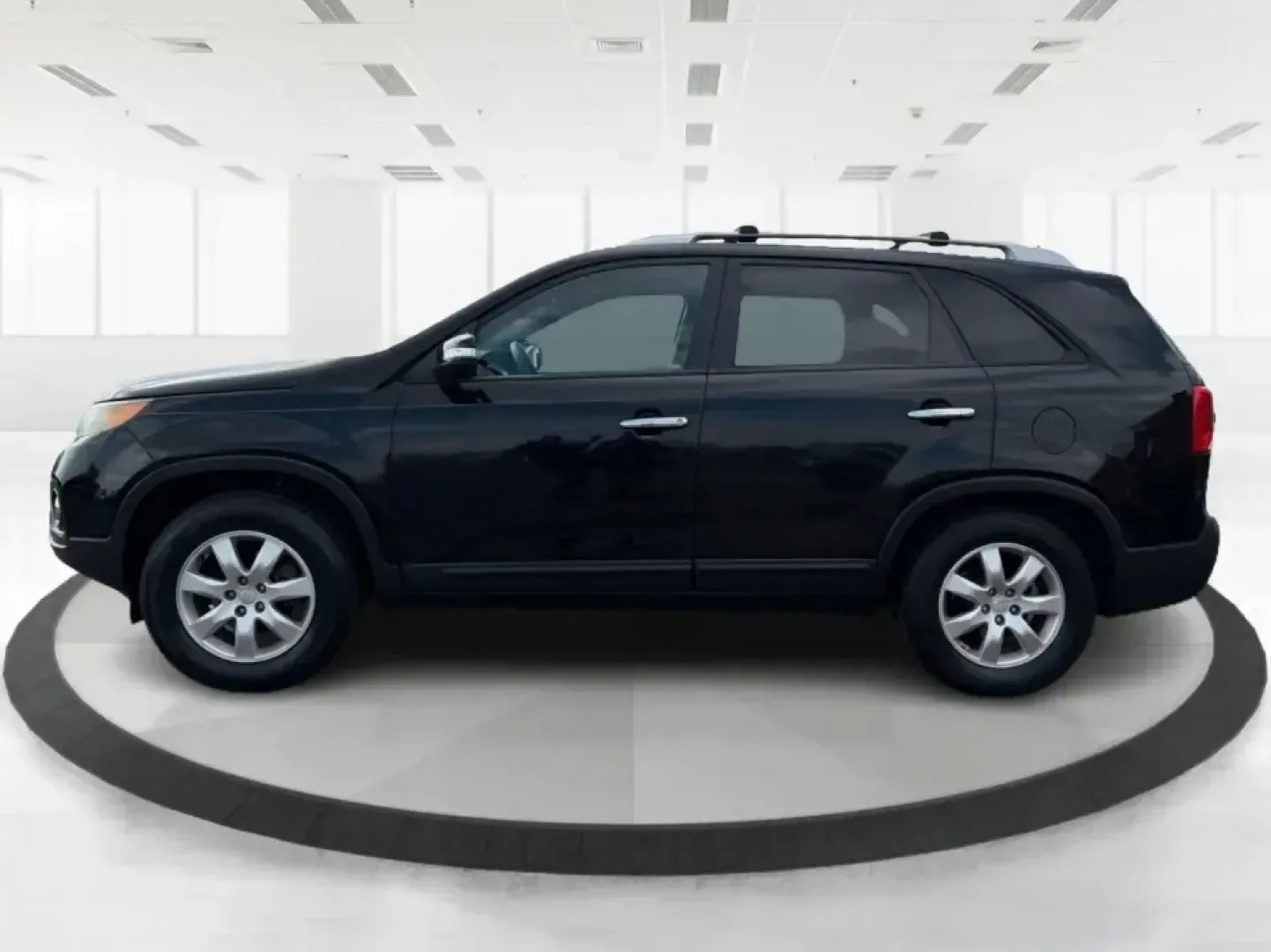 2012 Kia Sorento LX (5XYKT3A68CG) with an 2.4L I-4 gasoline direct injection engine, 6-Speed Automatic transmission, located at 1230 East Main St, Xenia, OH, 45385, (937) 908-9800, 39.688026, -83.910172 - Weekend getaways to John Bryan State Park, daily school drop-offs around Xenia, or an easy commute toward Beavercreek and Dayton-this Ebony Black 2012 Kia Sorento LX is the kind of SUV that fits real life. With practical space, confident road manners, and comfort features you'll appreciate on longer - Photo#5