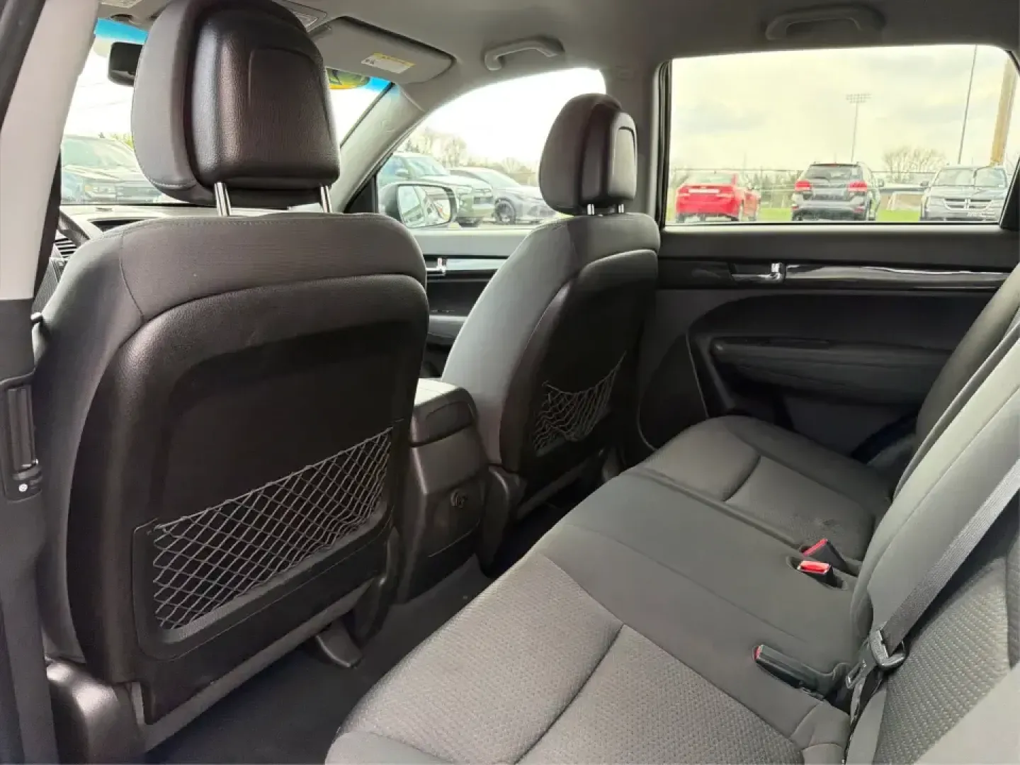 2012 Kia Sorento LX (5XYKT3A68CG) with an 2.4L I-4 gasoline direct injection engine, 6-Speed Automatic transmission, located at 1230 East Main St, Xenia, OH, 45385, (937) 908-9800, 39.688026, -83.910172 - Weekend getaways to John Bryan State Park, daily school drop-offs around Xenia, or an easy commute toward Beavercreek and Dayton-this Ebony Black 2012 Kia Sorento LX is the kind of SUV that fits real life. With practical space, confident road manners, and comfort features you'll appreciate on longer - Photo#10