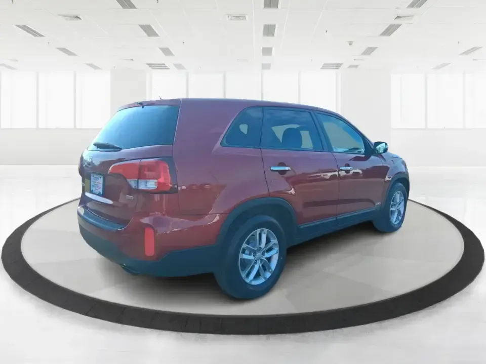 2014 Kia Sorento LX (5XYKTCA65EG) with an 2.4L I-4 gasoline direct injection engine, 6-Speed Automatic transmission, located at 1230 East Main St, Xenia, OH, 45385, (937) 908-9800, 39.688026, -83.910172 - Need one SUV that can handle Ohio winters, school drop-offs, and spontaneous weekend getaways to Indian Lake or a day trip to Dayton? This 2014 Kia Sorento LX in eye-catching Remington Red Metallic is a practical, confidence-building choice for busy families, commuters, and adventure-minded drivers - Photo#2