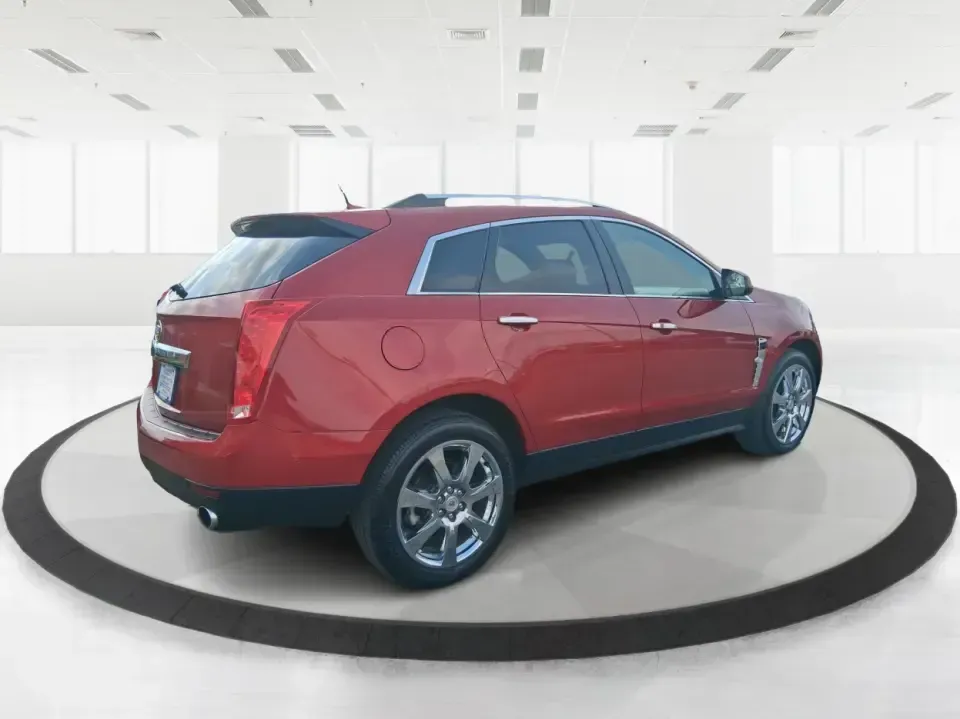 2011 Cadillac SRX Performance Collection (3GYFNEEY2BS) with an Ecotec 3L V-6 gasoline direct injection engine, 6-Speed Automatic transmission, located at 4508 South Dixie Dr, Moraine, OH, 45439, (937) 908-9800, 39.689976, -84.218452 - Picture your next road trip out of Moraine: the family loaded up, playlists ready, and plenty of space for sports gear, groceries, or weekend bags-without giving up comfort or style. This 2011 Cadillac SRX Performance Collection is the kind of SUV that fits real life in the Miami Valley: confident f - Photo#2
