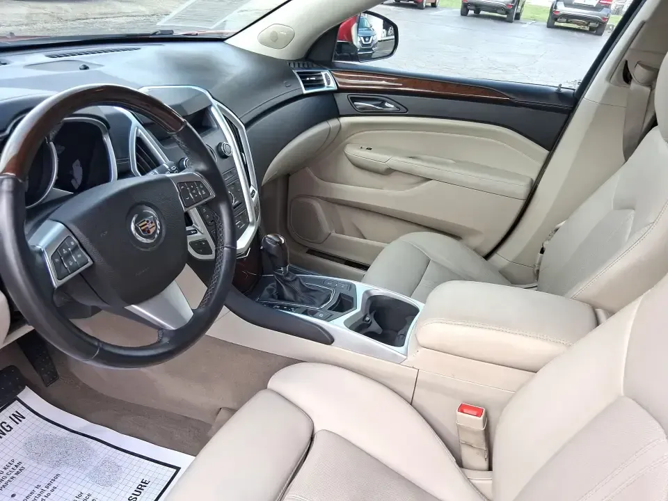 2011 Cadillac SRX Performance Collection (3GYFNEEY2BS) with an Ecotec 3L V-6 gasoline direct injection engine, 6-Speed Automatic transmission, located at 4508 South Dixie Dr, Moraine, OH, 45439, (937) 908-9800, 39.689976, -84.218452 - Picture your next road trip out of Moraine: the family loaded up, playlists ready, and plenty of space for sports gear, groceries, or weekend bags-without giving up comfort or style. This 2011 Cadillac SRX Performance Collection is the kind of SUV that fits real life in the Miami Valley: confident f - Photo#9