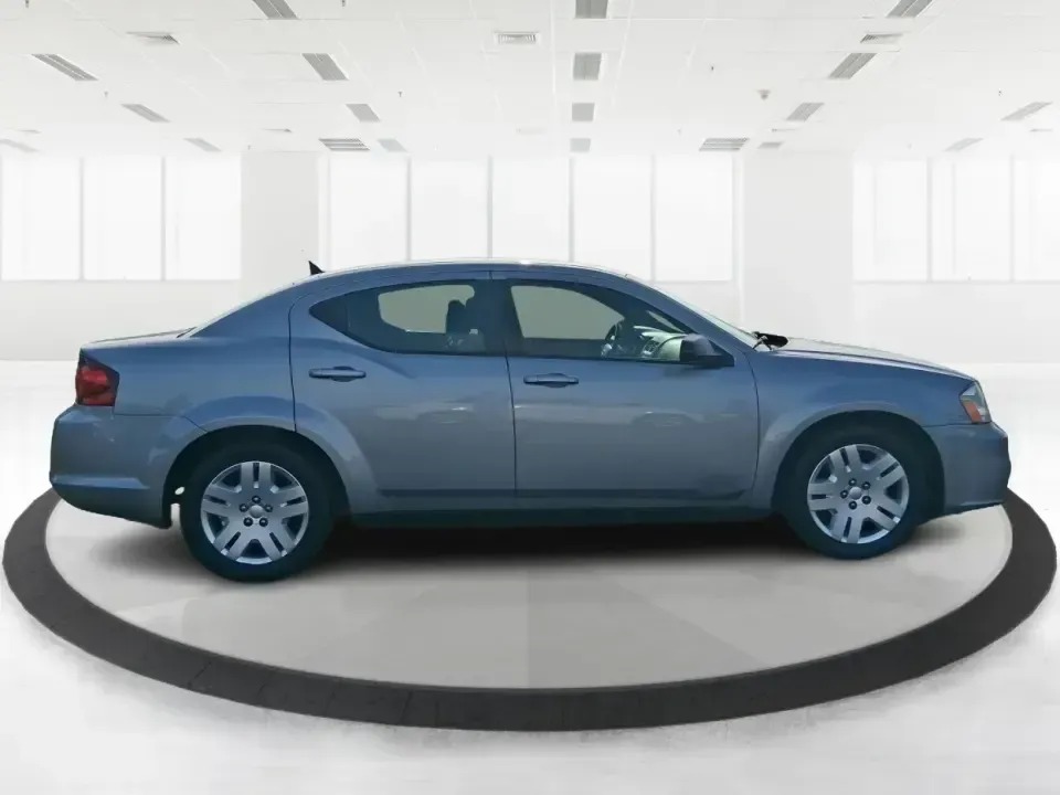 2014 Dodge Avenger SE (1C3CDZAB8EN) with an 2.4L L4 DOHC 16V engine, 4-Speed Automatic transmission, located at 1099 N County Rd 25A, Troy, OH, 45373, (937) 908-9800, 40.057079, -84.212883 - Picture an easy, stress-free daily commute from Moraine to downtown Dayton, with enough comfort for the school run, errands along South Dixie Drive, and the occasional weekend escape to Carillon Historical Park or a movie night near the Dayton Mall. If you want a practical sedan that fits real life- - Photo#1