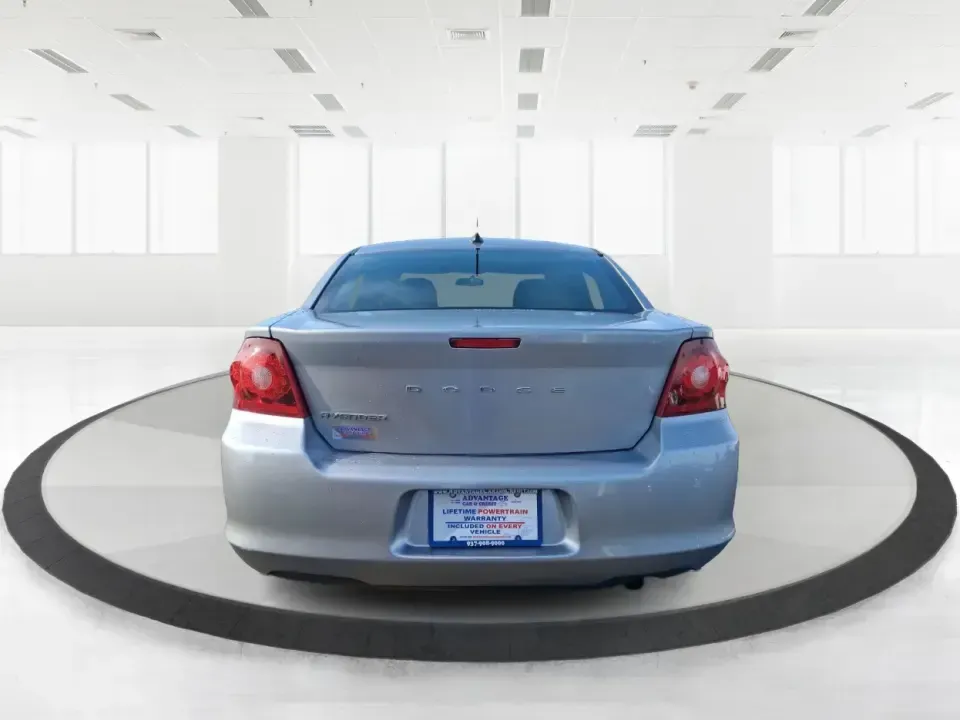 2014 Dodge Avenger SE (1C3CDZAB8EN) with an 2.4L L4 DOHC 16V engine, 4-Speed Automatic transmission, located at 1099 N County Rd 25A, Troy, OH, 45373, (937) 908-9800, 40.057079, -84.212883 - Picture an easy, stress-free daily commute from Moraine to downtown Dayton, with enough comfort for the school run, errands along South Dixie Drive, and the occasional weekend escape to Carillon Historical Park or a movie night near the Dayton Mall. If you want a practical sedan that fits real life- - Photo#3