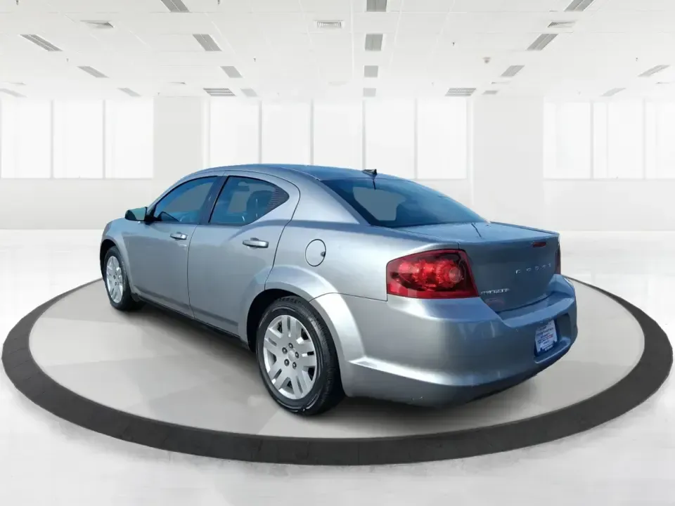 2014 Dodge Avenger SE (1C3CDZAB8EN) with an 2.4L L4 DOHC 16V engine, 4-Speed Automatic transmission, located at 1099 N County Rd 25A, Troy, OH, 45373, (937) 908-9800, 40.057079, -84.212883 - Picture an easy, stress-free daily commute from Moraine to downtown Dayton, with enough comfort for the school run, errands along South Dixie Drive, and the occasional weekend escape to Carillon Historical Park or a movie night near the Dayton Mall. If you want a practical sedan that fits real life- - Photo#4
