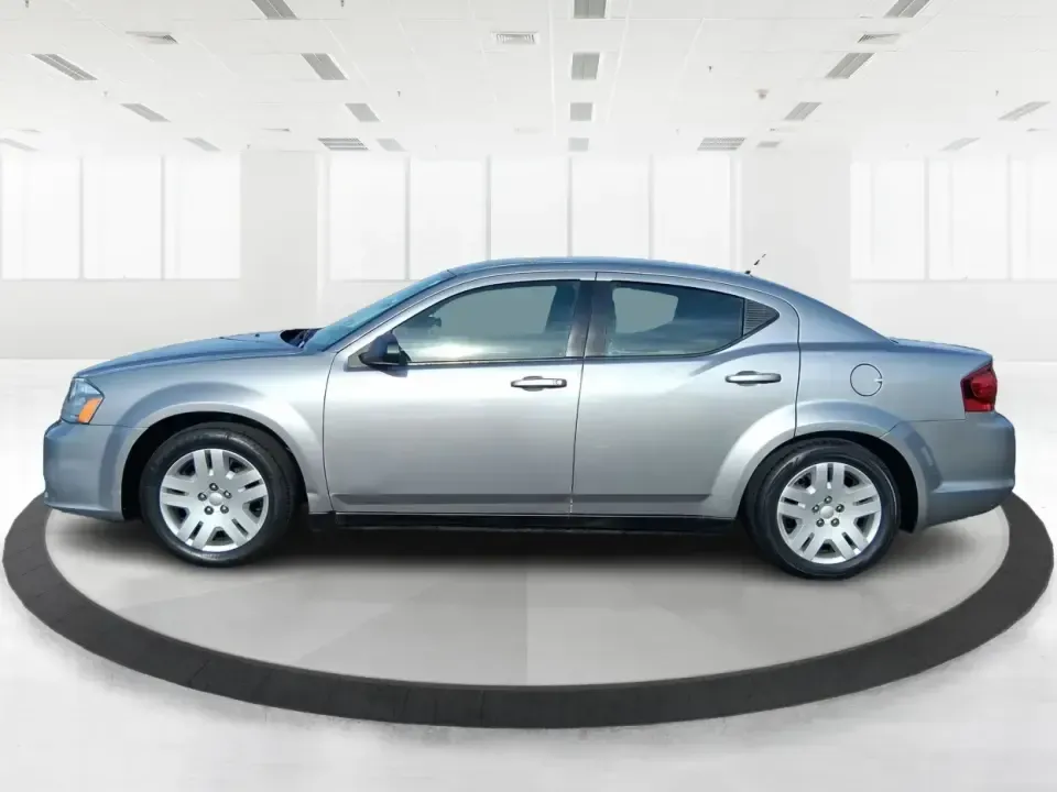 2014 Dodge Avenger SE (1C3CDZAB8EN) with an 2.4L L4 DOHC 16V engine, 4-Speed Automatic transmission, located at 1099 N County Rd 25A, Troy, OH, 45373, (937) 908-9800, 40.057079, -84.212883 - Picture an easy, stress-free daily commute from Moraine to downtown Dayton, with enough comfort for the school run, errands along South Dixie Drive, and the occasional weekend escape to Carillon Historical Park or a movie night near the Dayton Mall. If you want a practical sedan that fits real life- - Photo#5