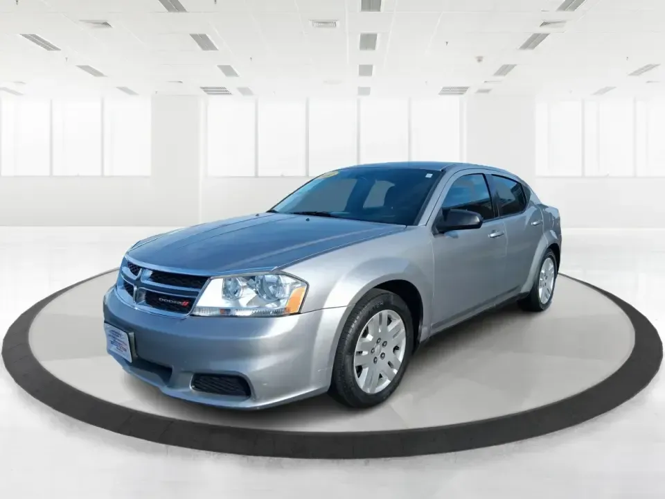 2014 Dodge Avenger SE (1C3CDZAB8EN) with an 2.4L L4 DOHC 16V engine, 4-Speed Automatic transmission, located at 1099 N County Rd 25A, Troy, OH, 45373, (937) 908-9800, 40.057079, -84.212883 - Picture an easy, stress-free daily commute from Moraine to downtown Dayton, with enough comfort for the school run, errands along South Dixie Drive, and the occasional weekend escape to Carillon Historical Park or a movie night near the Dayton Mall. If you want a practical sedan that fits real life- - Photo#8
