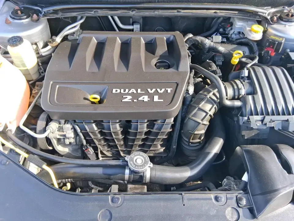 2014 Dodge Avenger SE (1C3CDZAB8EN) with an 2.4L L4 DOHC 16V engine, 4-Speed Automatic transmission, located at 1099 N County Rd 25A, Troy, OH, 45373, (937) 908-9800, 40.057079, -84.212883 - Picture an easy, stress-free daily commute from Moraine to downtown Dayton, with enough comfort for the school run, errands along South Dixie Drive, and the occasional weekend escape to Carillon Historical Park or a movie night near the Dayton Mall. If you want a practical sedan that fits real life- - Photo#11