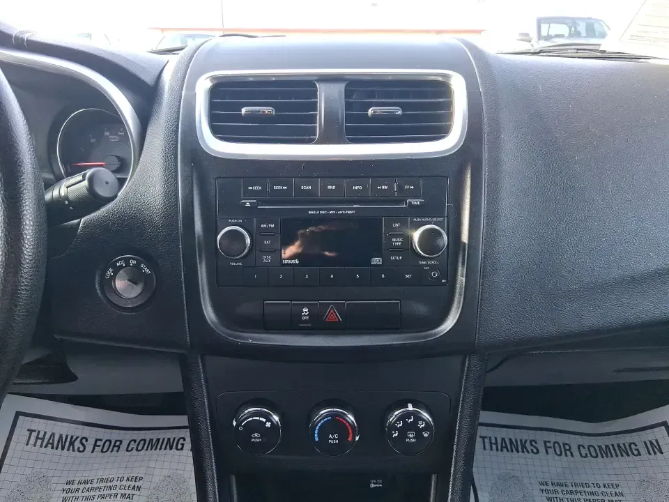 2014 Dodge Avenger SE (1C3CDZAB8EN) with an 2.4L L4 DOHC 16V engine, 4-Speed Automatic transmission, located at 1099 N County Rd 25A, Troy, OH, 45373, (937) 908-9800, 40.057079, -84.212883 - Picture an easy, stress-free daily commute from Moraine to downtown Dayton, with enough comfort for the school run, errands along South Dixie Drive, and the occasional weekend escape to Carillon Historical Park or a movie night near the Dayton Mall. If you want a practical sedan that fits real life- - Photo#13