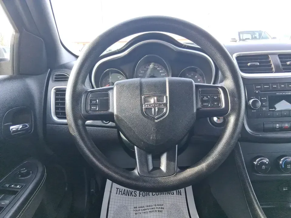 2014 Dodge Avenger SE (1C3CDZAB8EN) with an 2.4L L4 DOHC 16V engine, 4-Speed Automatic transmission, located at 1099 N County Rd 25A, Troy, OH, 45373, (937) 908-9800, 40.057079, -84.212883 - Picture an easy, stress-free daily commute from Moraine to downtown Dayton, with enough comfort for the school run, errands along South Dixie Drive, and the occasional weekend escape to Carillon Historical Park or a movie night near the Dayton Mall. If you want a practical sedan that fits real life- - Photo#16