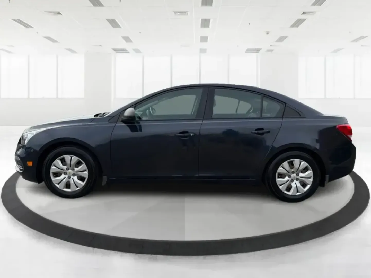 2016 Chevrolet Cruze Limited LS Auto (1G1PC5SG5G7) with an ECOTEC 1.8L I-4 DOHC engine, 6A transmission, located at 1099 N County Rd 25A, Troy, OH, 45373, (937) 908-9800, 40.057079, -84.212883 - Need a dependable, fuel-friendly commuter that can handle daily drives from Troy to Dayton, school drop-offs, and the occasional weekend getaway without draining your budget? This 2016 Chevrolet Cruze Limited LS Auto is the kind of practical sedan that fits real life-easy to park downtown, comfortab - Photo#5
