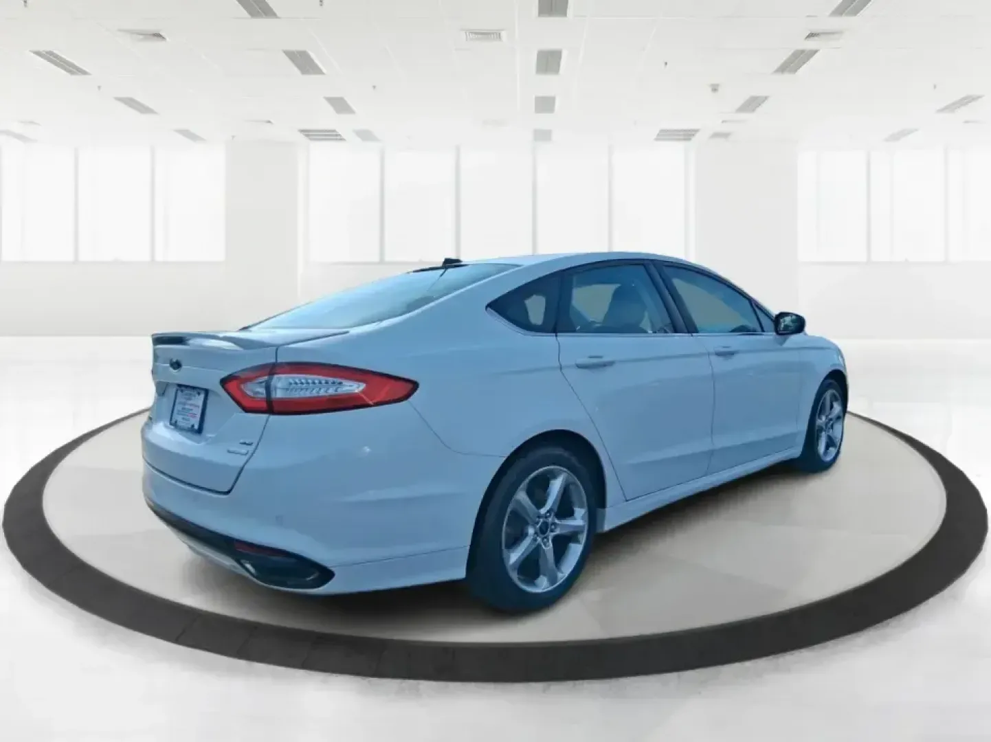 2016 Ford Fusion SE (3FA6P0H91GR) with an 2.0L L4 DOHC 16V engine, 6-Speed Automatic transmission, located at 880 E. National Road, Vandalia, OH, 45377, (937) 908-9800, 39.891918, -84.183594 - Need a dependable commuter that can handle I75 traffic, school drop-offs, and weekend runs to Dayton without draining your budget? This 2016 Ford Fusion SE in Oxford White is the kind of practical, comfortable sedan that fits real life in Vandalia-smooth for daily driving, efficient on regular unlea - Photo#2